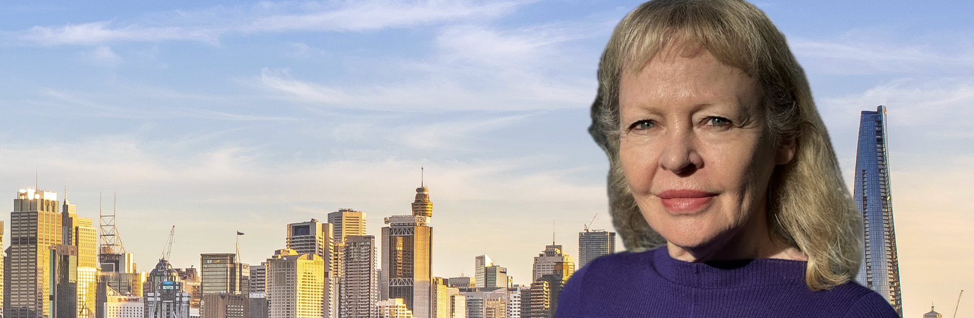 Sue Ritchie with the Sydney City skyline behind her